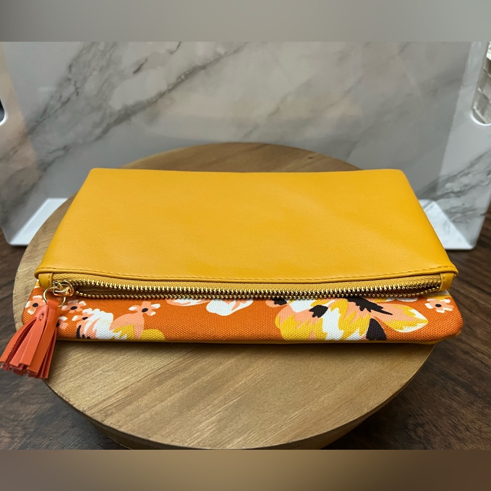 Rachel Pally Orange/Flower Reversible Clutch. Never used